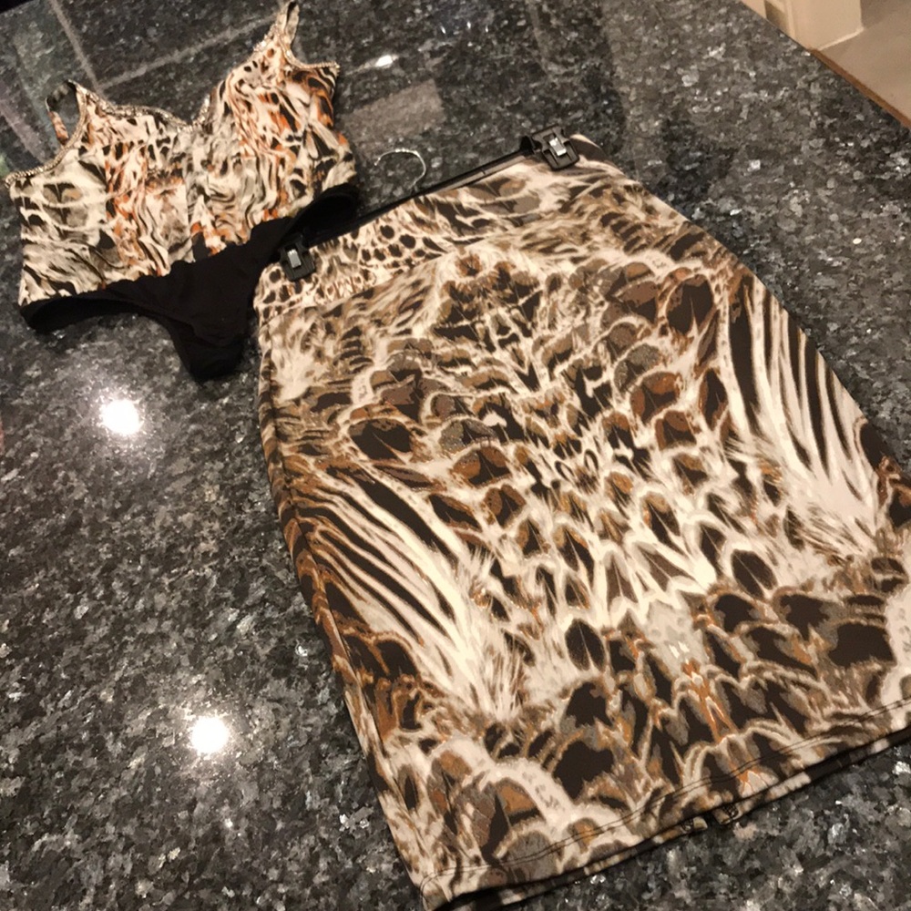 Bebe bodysuit with skirt.